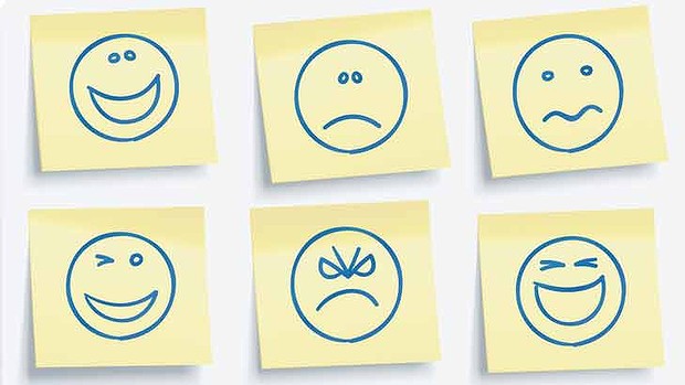 sticky notes with faces portraying different emotions
