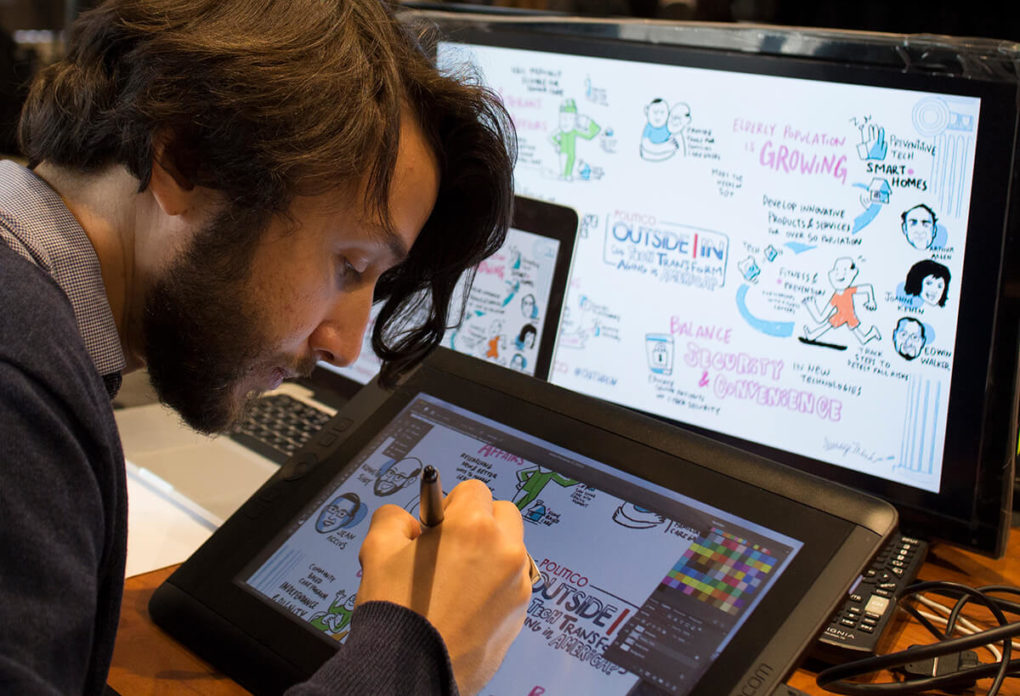 An image of an ImageThink visual strategist using digital graphic recording to capture an event. As a visual medium, graphic recording emphasizes DEI.
