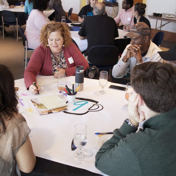 Image of UAH team working visually together.
