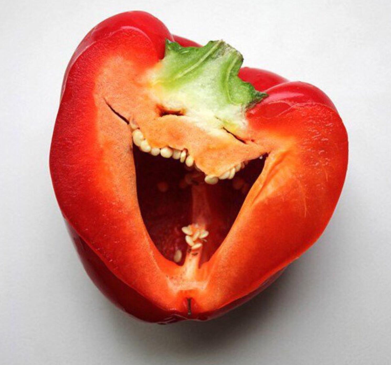 An example of pareidolia, this photo depicts a red pepper that looks like a smiling human face.