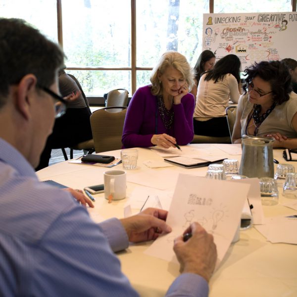 An image of a group working visually together.