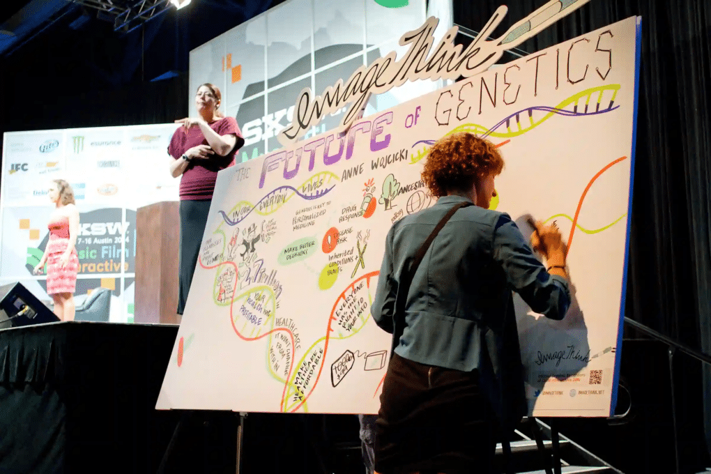 Visual strategist Nora illustrating a live mural on the future of genetics at a pharma event.