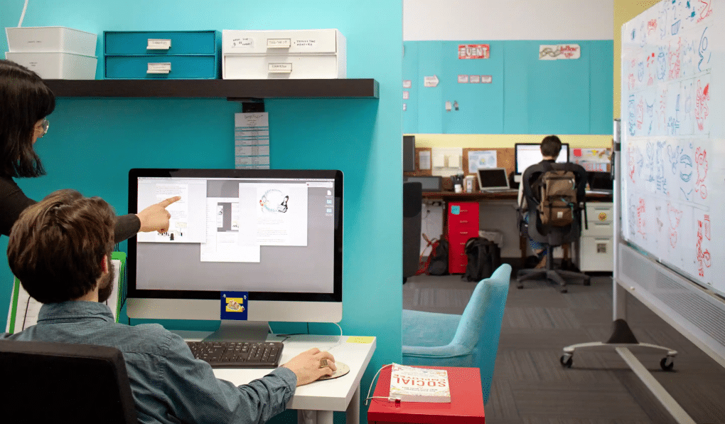 Visual boards help teams align during a new-hire onboarding workshop.